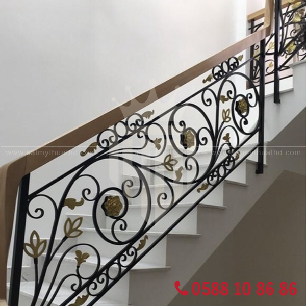 Mẫu cầu thang sắt mỹ thuật đẹp với lan can hoa văn tinh xảo