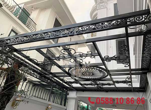 Mái kính khung thép hiện đại kết hợp kính cường lực bền vững
