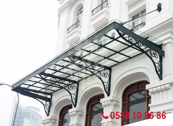 Mái kính màu trà che sảnh công trình